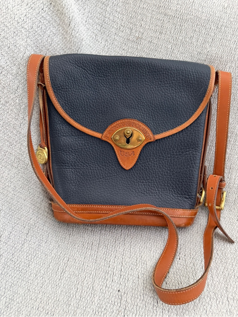 Dooney & Bourke Vintage Dark Navy and Tan All Weather Leather Crossbody Bag
